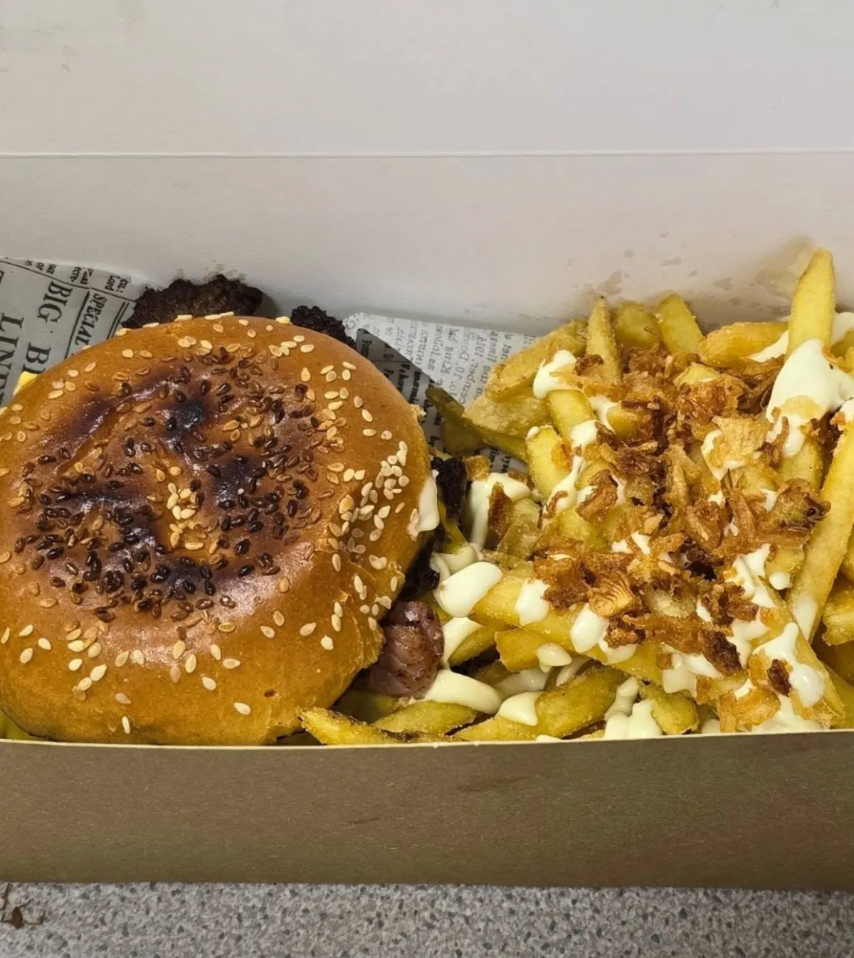 Burger and loaded fries at Digin’s Hut
