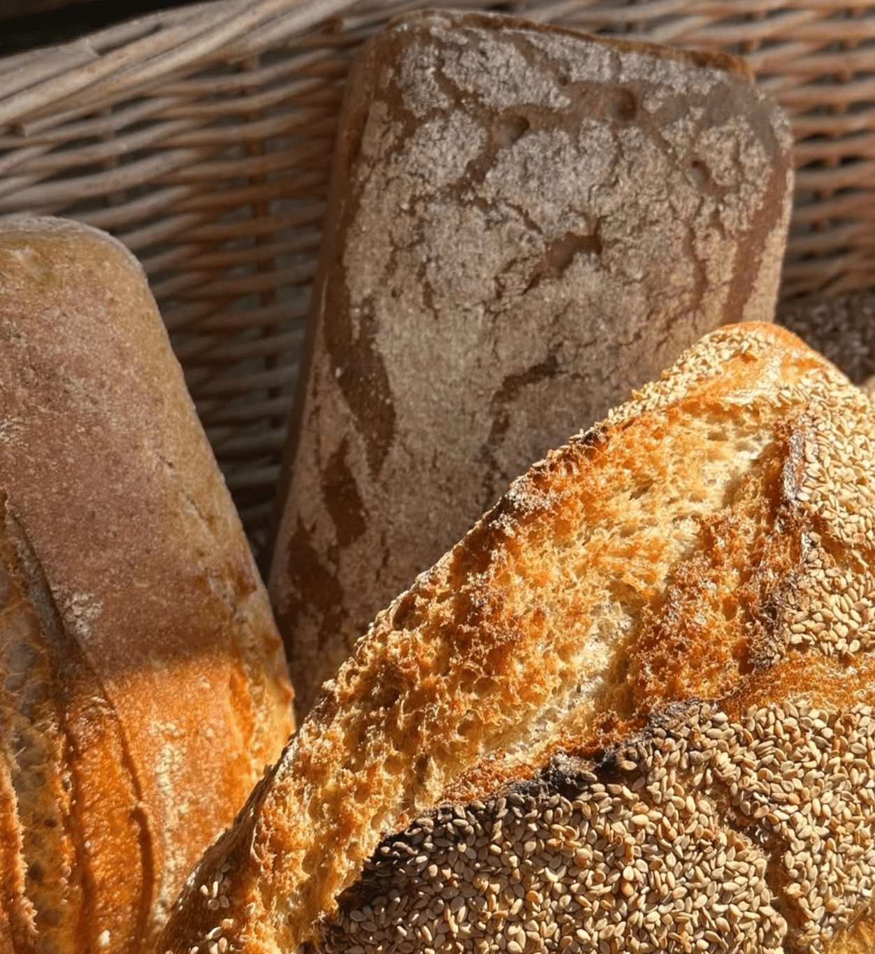 Bread basket with fresh loaves at House of Bread